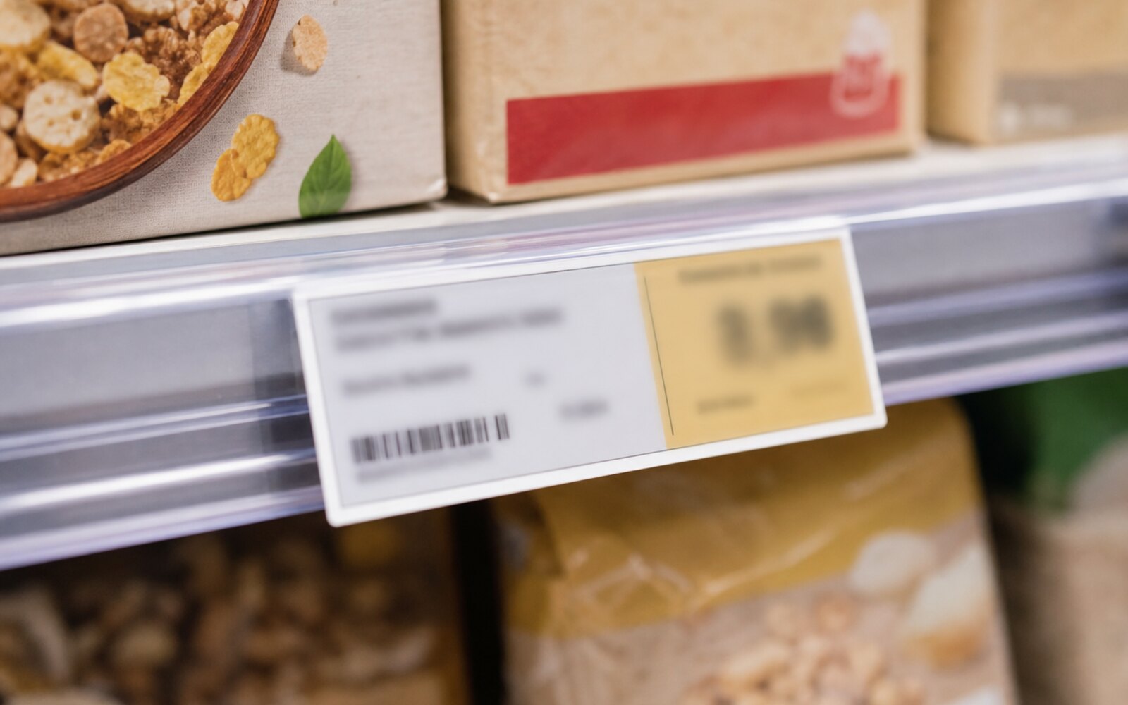 Étiquette de rayon affichant le prix du paquet et le prix au kilo